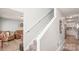 Staircase leading to the second floor, visible entrance to the living room and kitchen at 3929 Wexford Ln, Denver, NC 28037