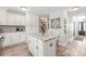Bright kitchen features white cabinets, granite countertops, and stainless steel appliances at 3929 Wexford Ln, Denver, NC 28037