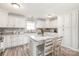 Beautiful kitchen with white cabinetry, granite countertops, a central island, and stainless appliances at 3929 Wexford Ln, Denver, NC 28037