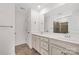 Clean bathroom with a double vanity, large mirror, and glass-enclosed shower at 4253 Spadefoot Ct, Lancaster, SC 29720