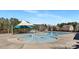 Community pool area features a splash area with sprinklers and lounge seating at 4253 Spadefoot Ct, Lancaster, SC 29720