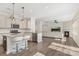 Modern kitchen open to living room, featuring granite countertops, an island and stainless steel appliances at 4253 Spadefoot Ct, Lancaster, SC 29720