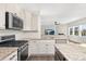 Well-equipped kitchen with granite countertops, stainless steel appliances and an open concept design at 4253 Spadefoot Ct, Lancaster, SC 29720