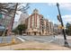 Attractive multi-story brick building with tan trim and balconies on a city street corner at 572 N Church St, Charlotte, NC 28202