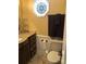 Charming half bathroom with a decorative mirror and a golden countertop at 591 Bent Oak Trl, Concord, NC 28027
