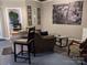 Casual living room with bar seating, comfy sofa, and artwork at 591 Bent Oak Trl, Concord, NC 28027
