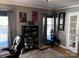 Office space with stylish decor, featuring a comfortable desk area and ample storage at 591 Bent Oak Trl, Concord, NC 28027