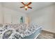 Well lit bedroom with bathroom access and plush bed at 611 N York St, Gastonia, NC 28052