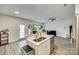 Bright kitchen with open layout to the living room featuring stainless steel appliances at 611 N York St, Gastonia, NC 28052