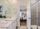 Serene bathroom with double vanity, walk-in shower, and a view into the bedroom at 6271 Fairfax Ct, Maiden, NC 28650
