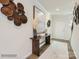 Stylish foyer featuring wood floors, decorative wall art, and a console table with elegant decor at 6271 Fairfax Ct, Maiden, NC 28650