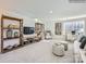Spacious living room with bookshelves, comfortable seating, and modern decor at 6271 Fairfax Ct, Maiden, NC 28650