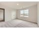 Inviting bedroom with carpet flooring, neutral walls, a double closet, and ample natural light from a window at 6277 Fairfax Ct, Maiden, NC 28650