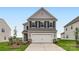 Charming two-story home with a symmetrical design, a two-car garage, and a well-manicured lawn at 6277 Fairfax Ct, Maiden, NC 28650