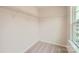 Spacious walk-in closet with wire shelving and a window for natural light at 6277 Fairfax Ct, Maiden, NC 28650