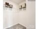 Bright walk-in closet with custom shelving for organization and easy storage at 6289 Fairfax Ct, Maiden, NC 28650