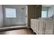 Modern bathroom features glass enclosed shower, pebble floor, and double sink vanity at 8703 Ellington Park Dr, Charlotte, NC 28277
