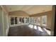 This sunroom features lots of windows and a vaulted ceiling at 8703 Ellington Park Dr, Charlotte, NC 28277