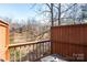 The balcony overlooks a stream with a view of nature, providing a serene escape at 1420 11Th Street Nw Dr # 15, Hickory, NC 28601