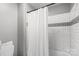 Neat bathroom with a shower-tub with white subway tile and decorative tile band at 1420 11Th Street Nw Dr # 15, Hickory, NC 28601
