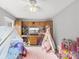 Comfortable bedroom with a canopy bed, decorative tents, ceiling fan and built-in shelving at 1420 11Th Street Nw Dr # 15, Hickory, NC 28601