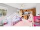 Cute bedroom with a canopy bed, decorative tents, ceiling fan and built-in shelving at 1420 11Th Street Nw Dr # 15, Hickory, NC 28601