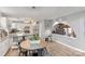 Bright kitchen featuring stainless steel appliances, granite countertops and wooden dining table at 1420 11Th Street Nw Dr # 15, Hickory, NC 28601