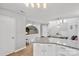 Bright kitchen featuring white cabinetry, granite countertops, and an open layout at 1420 11Th Street Nw Dr # 15, Hickory, NC 28601