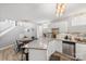 Open kitchen with granite countertops, stainless steel appliances, and a view of the staircase at 1420 11Th Street Nw Dr # 15, Hickory, NC 28601