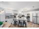 Modern kitchen with granite countertops, stainless steel appliances, and a cozy breakfast bar at 1420 11Th Street Nw Dr # 15, Hickory, NC 28601