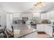 Bright kitchen showcasing granite countertops, stainless steel appliances, and white cabinetry at 1420 11Th Street Nw Dr # 15, Hickory, NC 28601