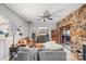 Spacious living room features stone accents, comfortable seating, and a cozy fireplace at 1420 11Th Street Nw Dr # 15, Hickory, NC 28601