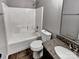 Bathroom featuring a shower-tub, toilet, and granite vanity at 11124 Chastain Parc Dr, Charlotte, NC 28216
