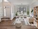 Bright living room featuring stylish furniture, a large window, and neutral colors for a cozy feel at 11124 Chastain Parc Dr, Charlotte, NC 28216