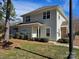 Charming two-story home with vinyl siding, well-maintained lawn, and neatly trimmed shrubbery at 11426 Savannah Creek Dr, Charlotte, NC 28273
