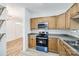 Stylish kitchen featuring modern appliances, updated cabinetry, and functional layout at 11426 Savannah Creek Dr, Charlotte, NC 28273