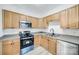 Functional kitchen with stainless appliances, sleek countertops, and ample cabinet space at 11426 Savannah Creek Dr, Charlotte, NC 28273