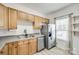 Updated kitchen featuring stainless steel appliances, ample cabinet space, and a bright window at 11426 Savannah Creek Dr, Charlotte, NC 28273