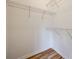 Walk-in closet featuring built-in shelving, providing ample storage space at 11426 Savannah Creek Dr, Charlotte, NC 28273