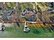 Waterfront home with private dock, lush landscaping, and lake views at 122 N Longfellow Ln, Mooresville, NC 28117