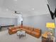 Spacious living room with a large sectional sofa, TV, billiard table, and modern lighting at 122 N Longfellow Ln, Mooresville, NC 28117