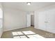 Bright bedroom with natural light and a double door closet at 137 Woodbridge Cir, Mount Holly, NC 28120