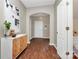 Inviting entryway showcases stylish flooring, a contemporary console table, and an arched doorway leading to the living areas at 137 Woodbridge Cir, Mount Holly, NC 28120