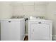 Functional laundry area featuring a Maytag washer and dryer at 137 Woodbridge Cir, Mount Holly, NC 28120