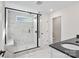 Luxurious bathroom showcases a glass-enclosed shower with marble tile and a modern vanity at 13705 Roderick Dr # 194, Huntersville, NC 28078