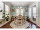 Charming dining area with natural light and a modern chandelier at 14827 Batteliere Dr, Charlotte, NC 28278