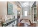Inviting foyer with hardwood floors, elegant lighting, and decorative accents, setting a stylish tone at 14827 Batteliere Dr, Charlotte, NC 28278