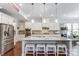 Bright kitchen with stainless steel appliances, granite countertops, and pendant lighting at 14827 Batteliere Dr, Charlotte, NC 28278