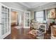 Home office featuring French doors, hardwood floors, and a bright, airy atmosphere at 14827 Batteliere Dr, Charlotte, NC 28278