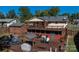 Expansive multi-level deck with seating areas, and an inground pool perfect for outdoor entertaining and relaxation at 1501 Fern Forest Dr, Gastonia, NC 28054